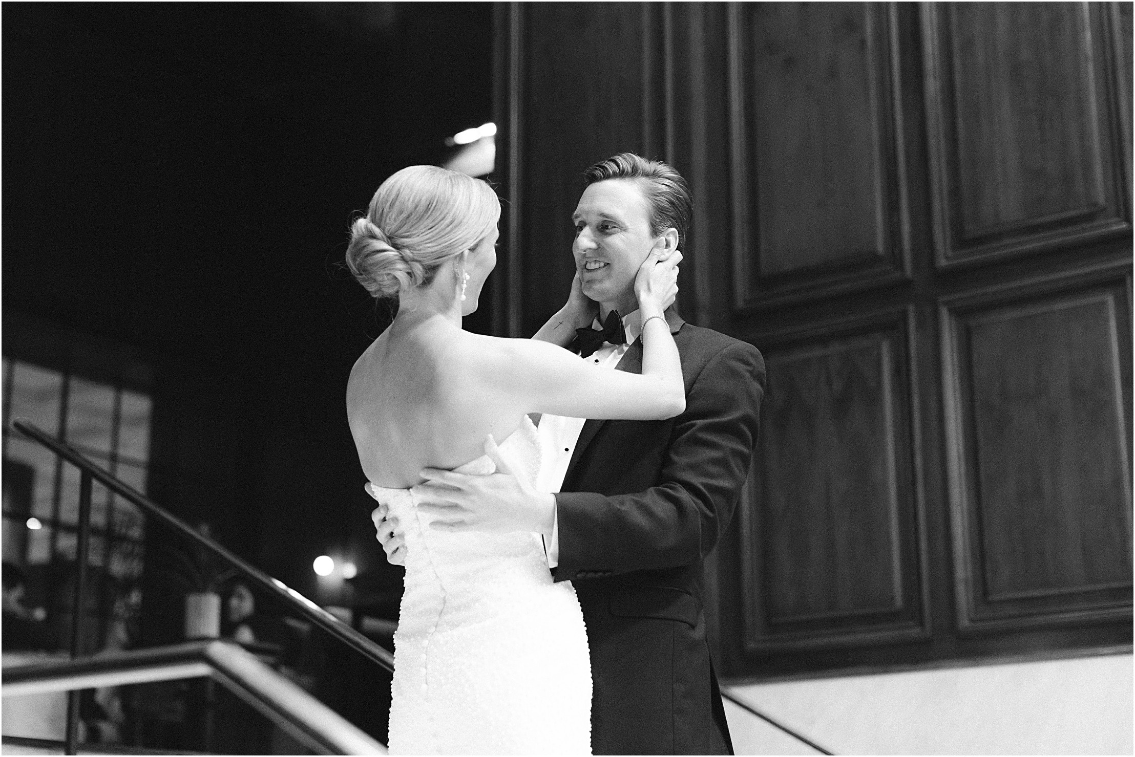 bride and groom first look at adolphus hotel on marble staircase in dallas texas