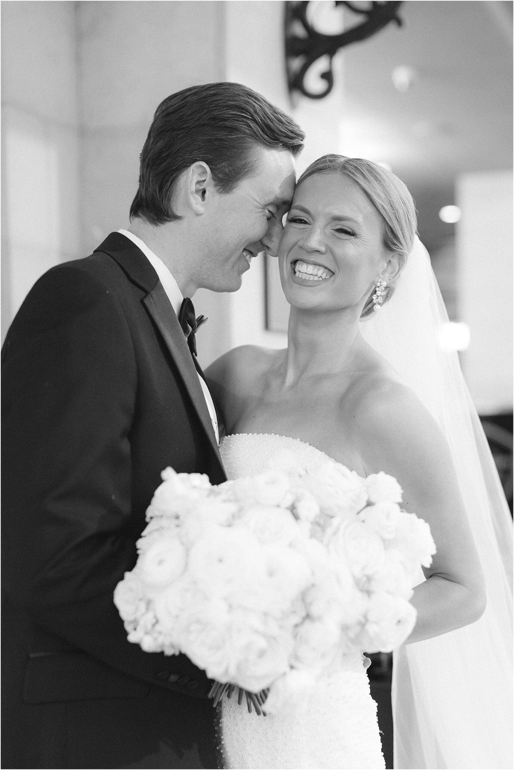 bride and groom in front of adolphus hotel in dallas texas