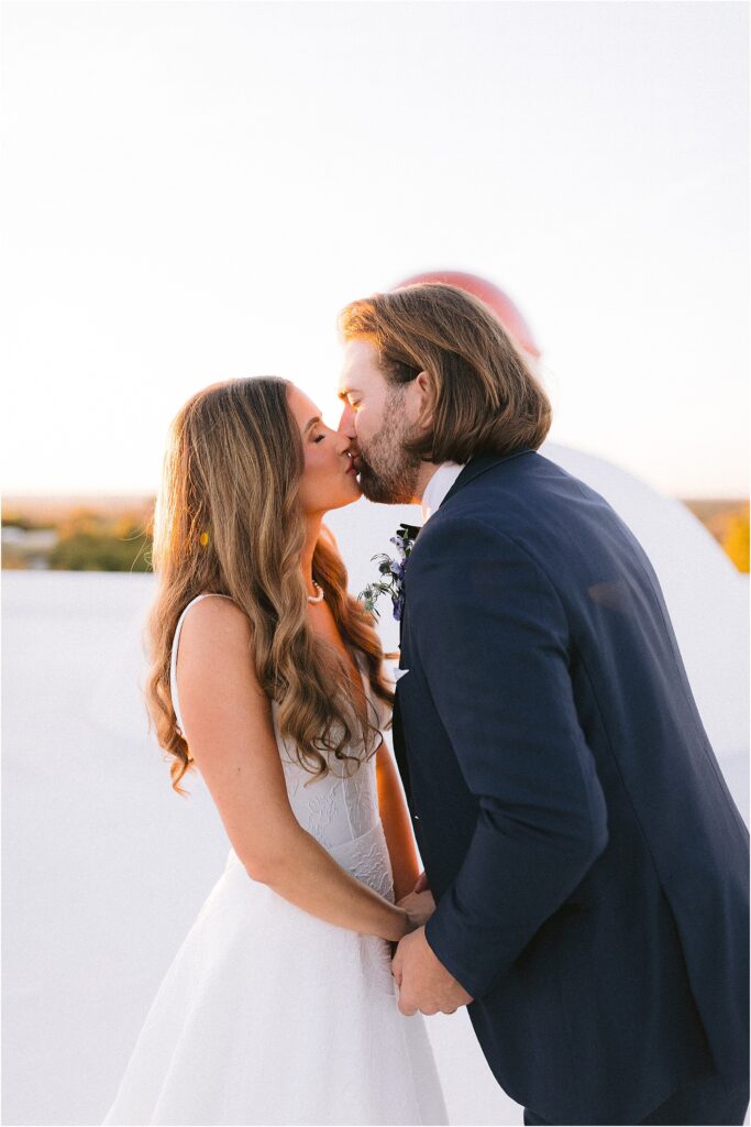 rooftop sunset bride and groom portrait at stoney ridge villa in fort worth Texas
