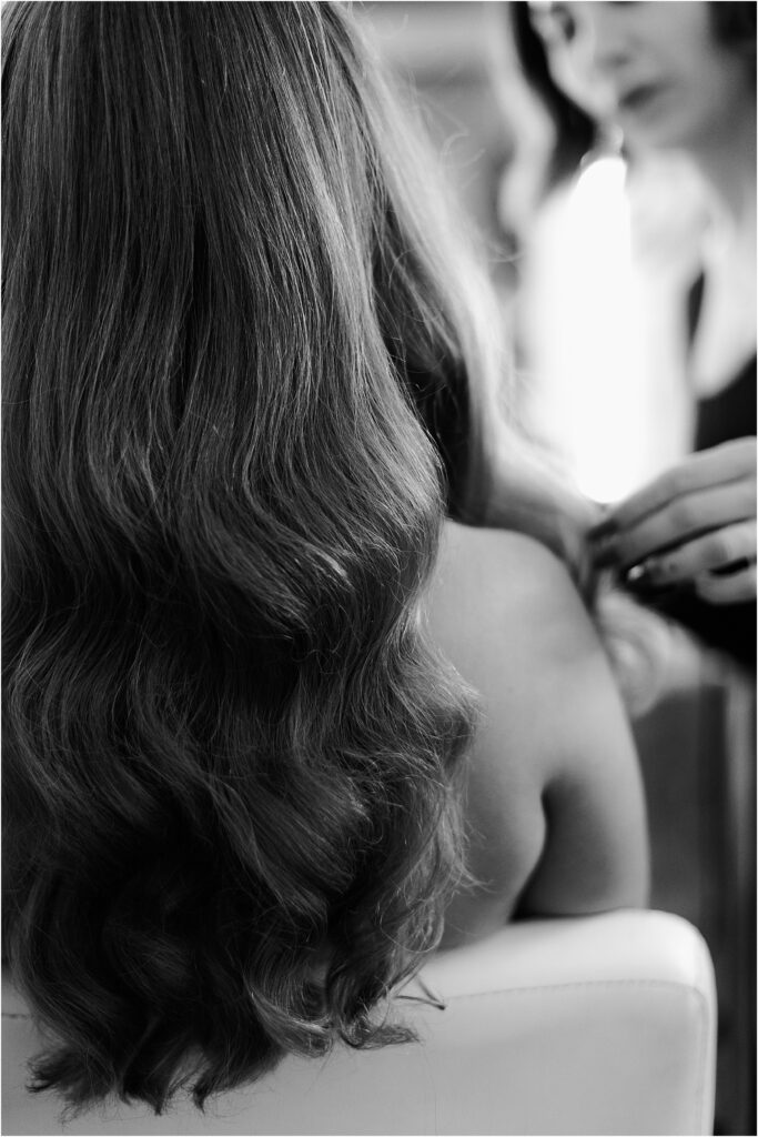 bride getting ready with long hair style