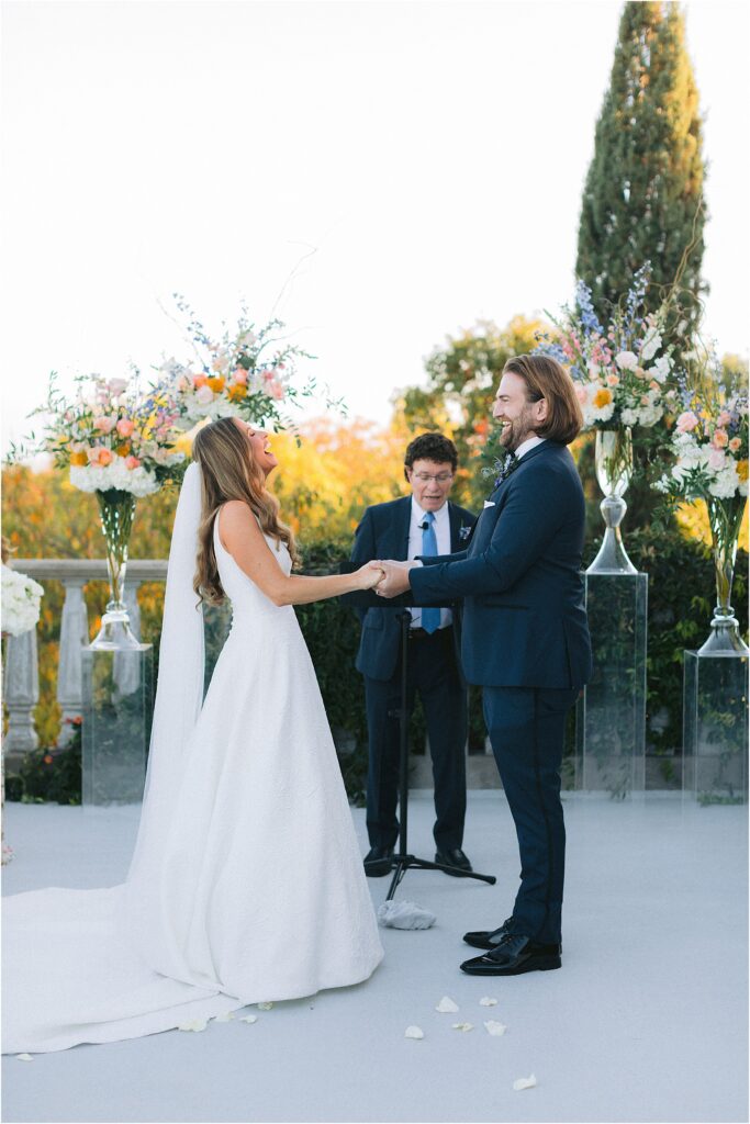 wedding ceremony on the terrace at stoney ridge villa in fort worth texas